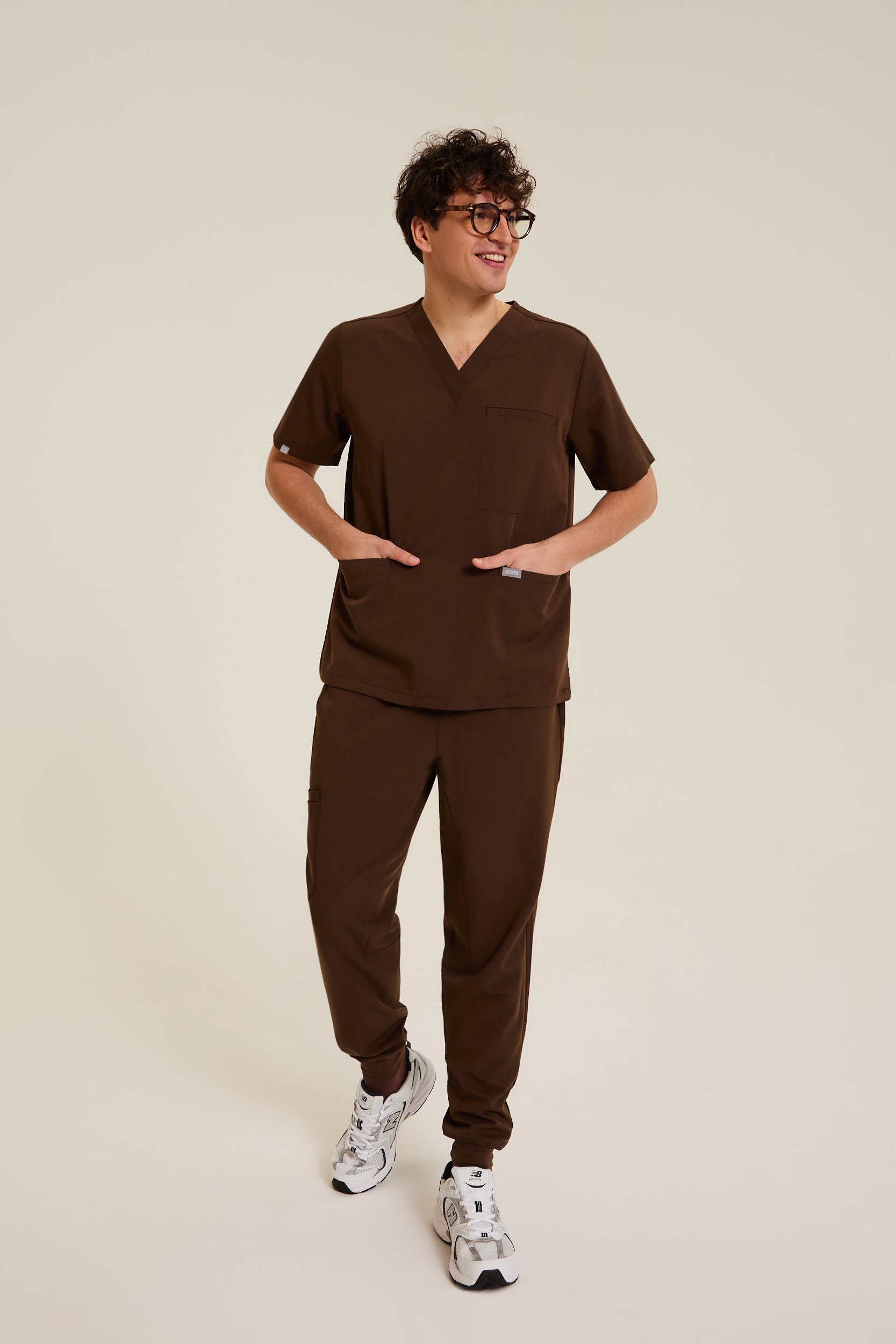 Men wearing brown medical scrubs with comfortable fit
Men’s brown medical scrubs designed for clinical environments
Professional brown scrubs for men