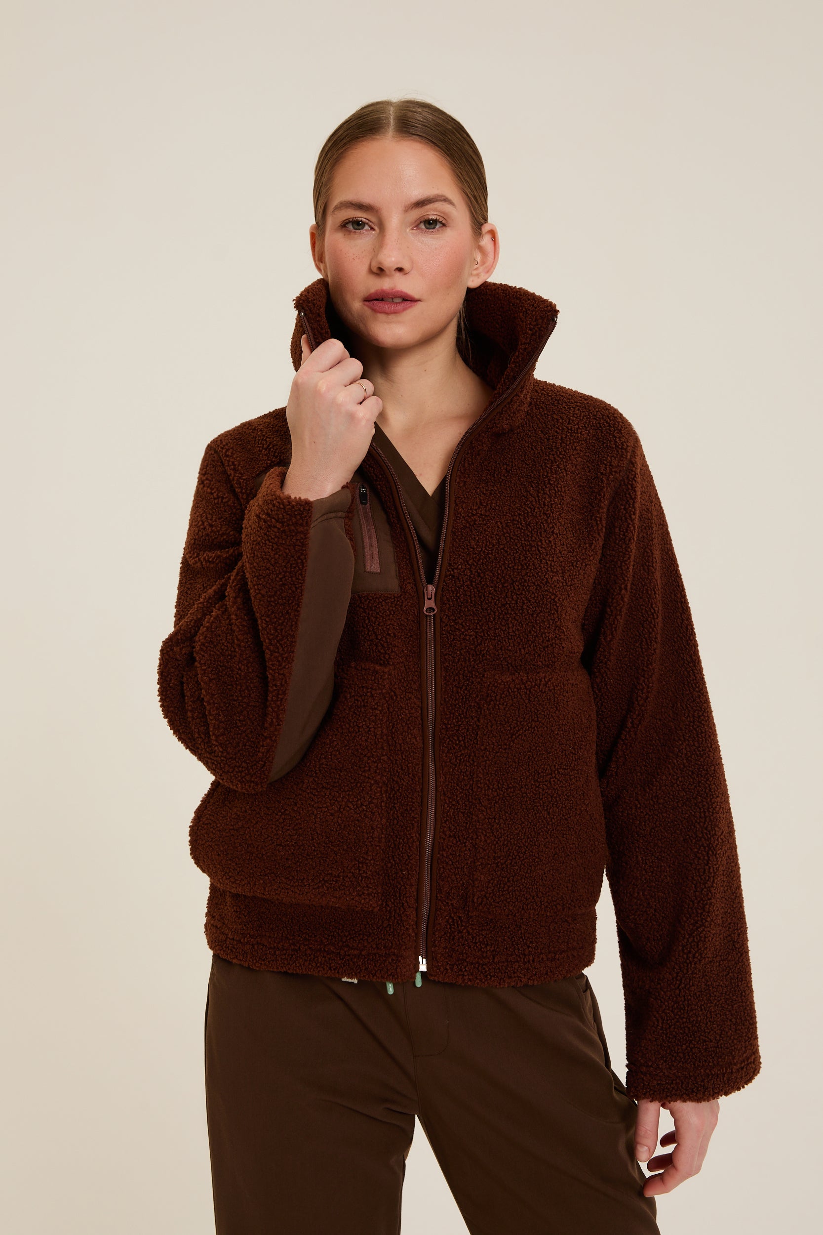 Bear-colour medical fleece providing warmth and comfort.Brown medical fleece jacket for clinical environments. Soft brown medical fleece for healthcare professionals