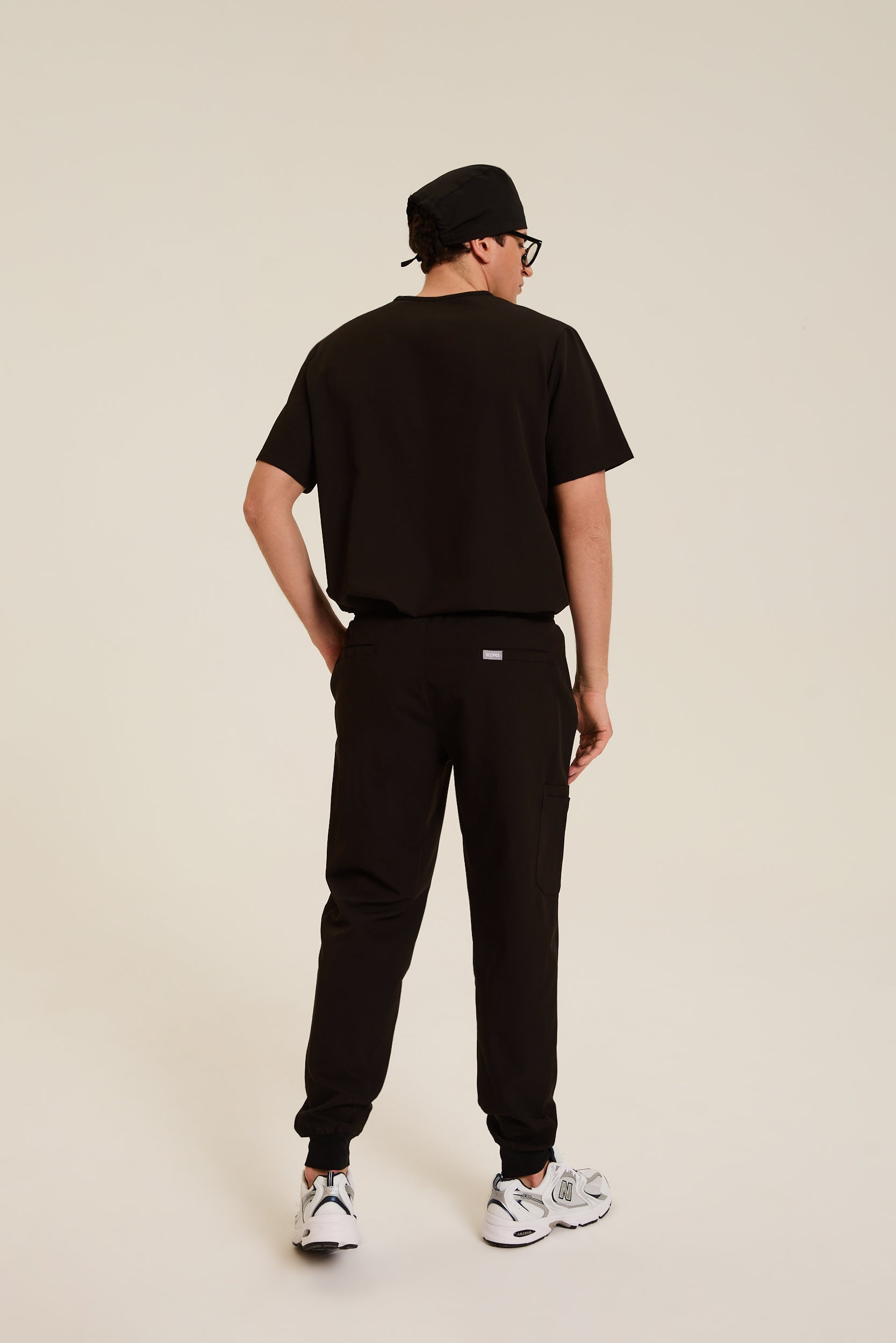 Men wearing black medical scrubs
Men’s black scrubs for healthcare professionals
Black men’s medical scrubs for hospital and clinic use