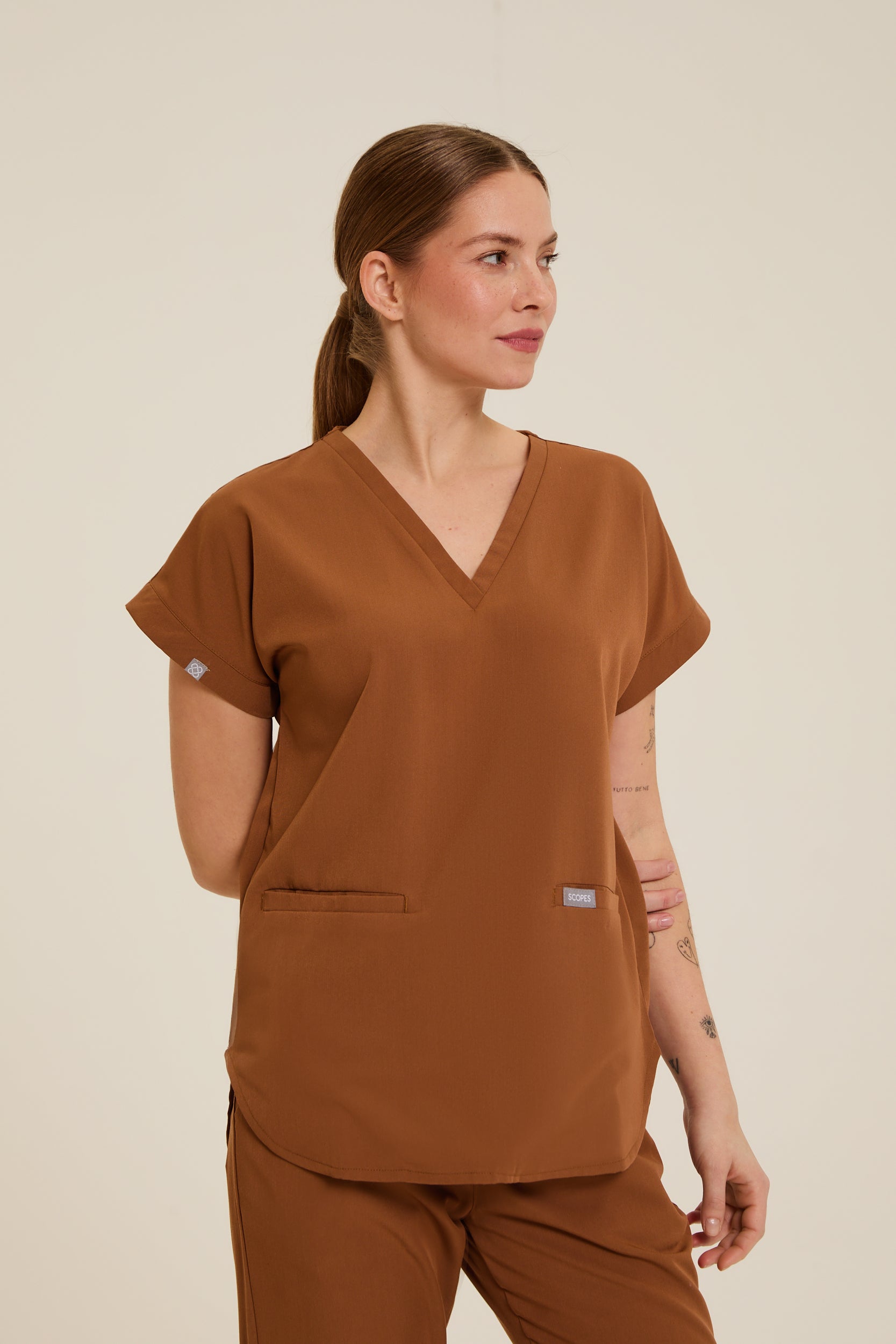 brown top with relaxed fit
brown long-sleeve top