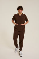 Men wearing brown medical scrubs with comfortable fit
Men’s brown medical scrubs designed for clinical environments
Professional brown scrubs for men