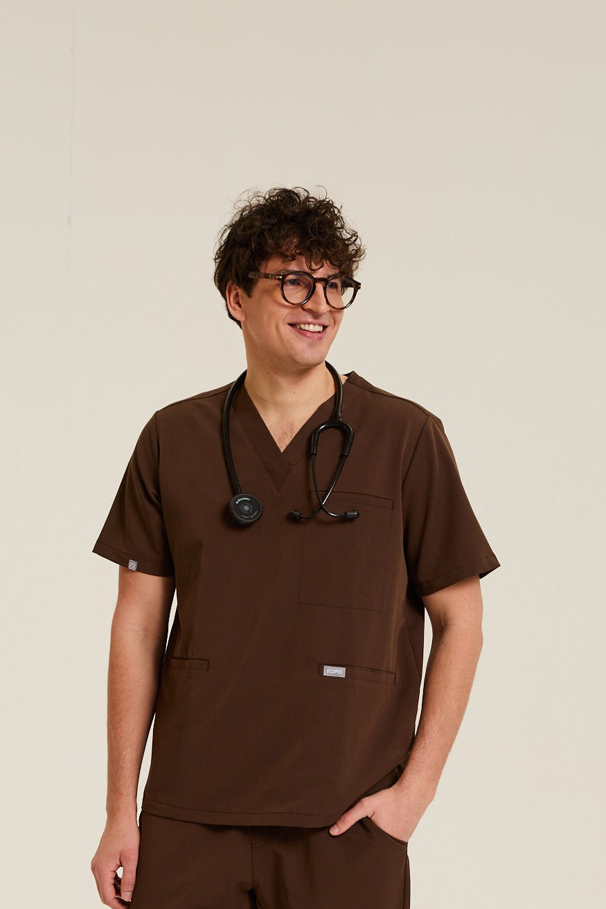 Men wearing brown medical scrubs
Brown scrubs for men
Men’s brown medical scrubs
Men’s brown healthcare scrubs
Brown men’s scrubs for clinical use