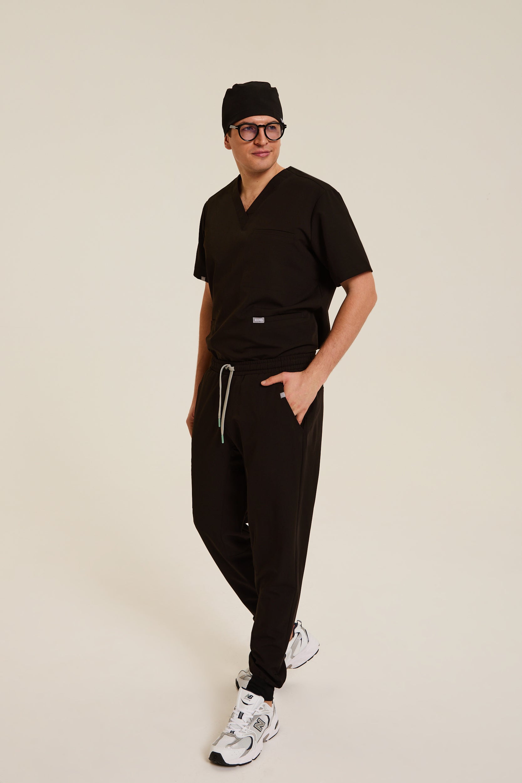 Men’s black medical scrubs – SCOPES
Professional black scrubs for women
Black men’s healthcare scrubs