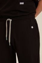 Men wearing black medical scrubs
Black scrubs for men
Men’s black healthcare scrubs