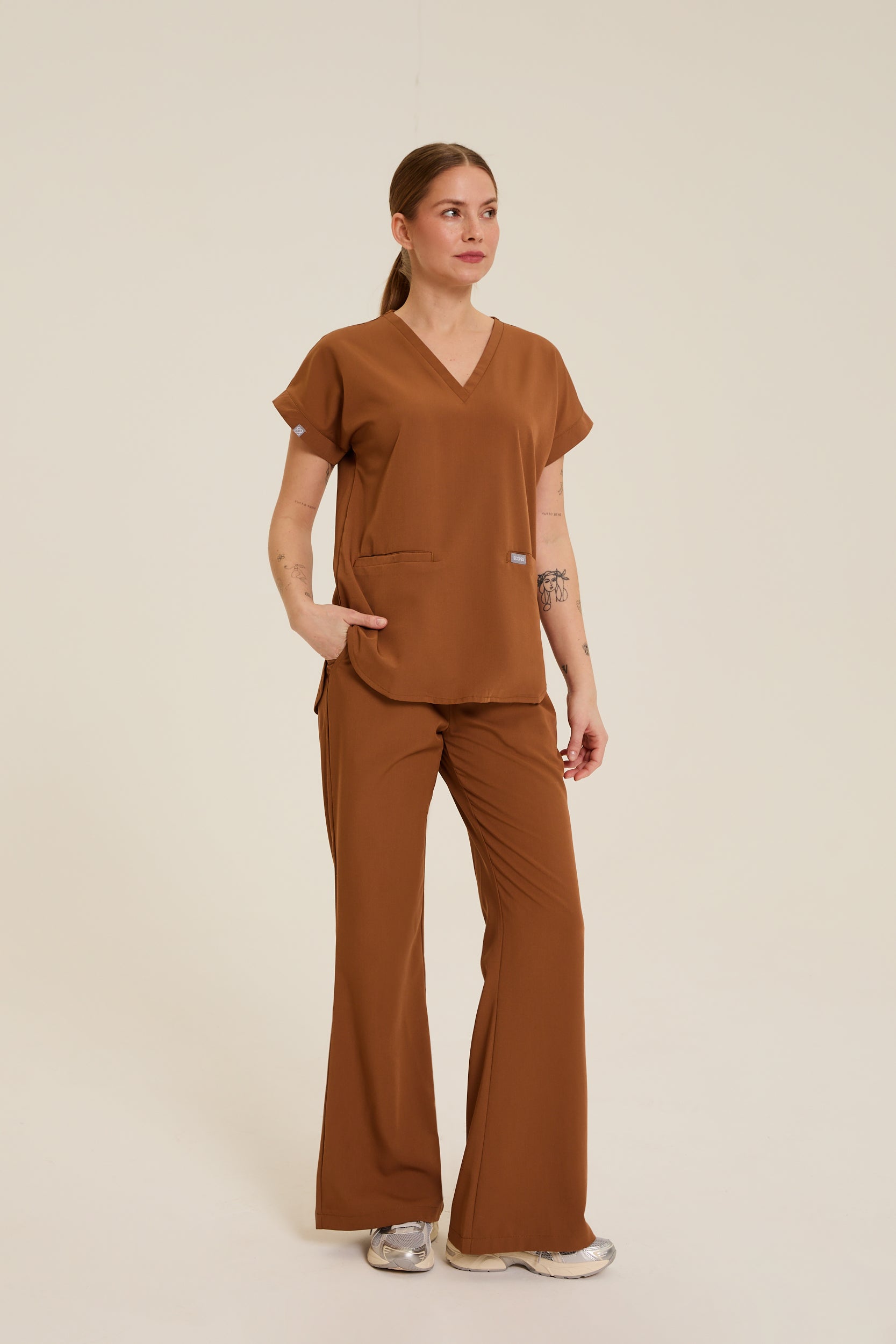 Brick-colored medical scrub top
Brick red scrub top
Terracotta medical scrub top