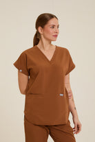  brown top with relaxed fit
 brown long-sleeve top