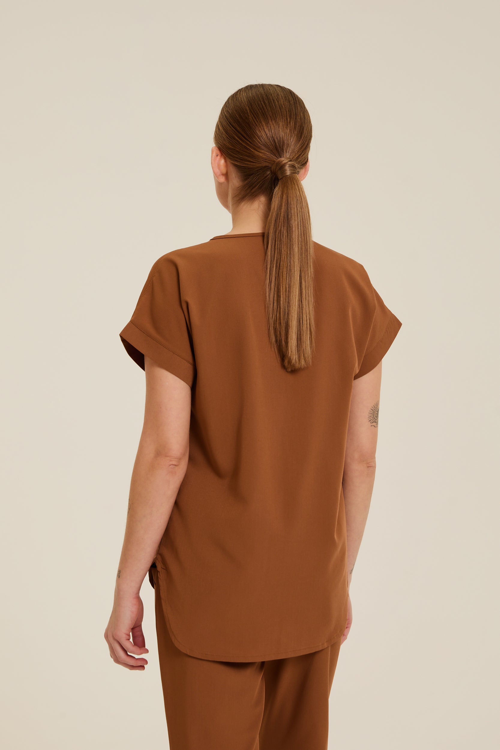 Brick-colored medical scrub top for healthcare professionals
Brick red medical scrub top
Terracotta scrub top for clinical use
